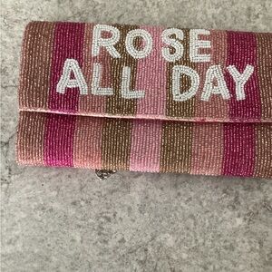 Rose all day clutch with strap